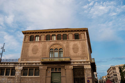 Low angle view of historical building against sky