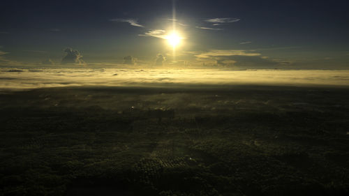 Scenic view of landscape against sky during sunset