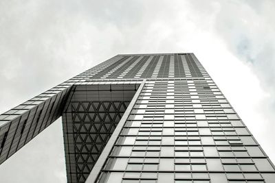 Low angle view of modern building against sky