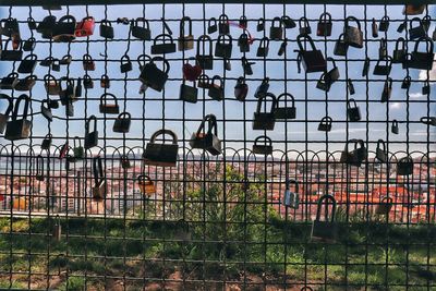 View of metal fence against sky