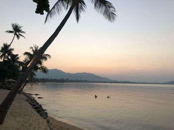 Scenic view of sea against sky at sunset