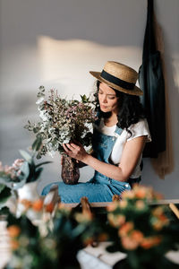 Woman holding flower bouquet