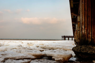 Scenic view of sea against sky during winter