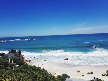 Scenic view of sea against blue sky