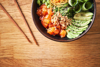 High angle view of chopped vegetables in bowl on table