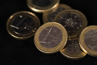 High angle view of coins on table