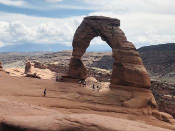 Scenic view of rock formations against sky moab arch national park