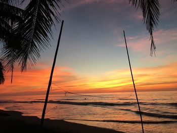 Scenic view of sea against sky at sunset