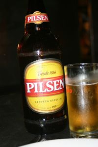Close-up of beer bottle against black background