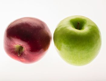 Close-up of apple on white background