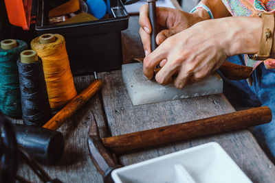 Man preparing food on cutting board