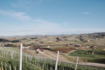 Panoramic shot of agricultural field against sky