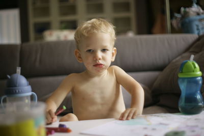 Portrait of cute boy at home