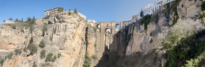 Panoramic view of rock formations against sky