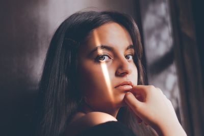 Close-up portrait of a young woman