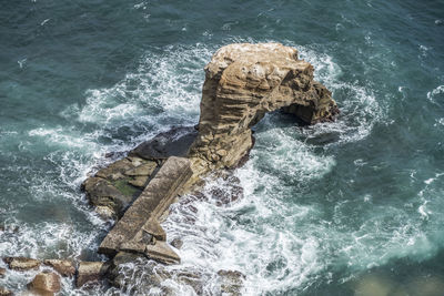 Arched rock on the sea in posillipo