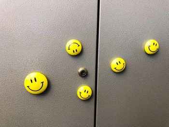 Anthropomorphic smiley face on doors