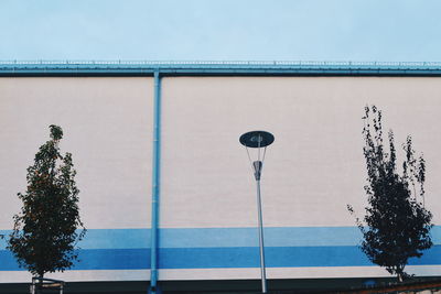 Low angle view of street light against sky