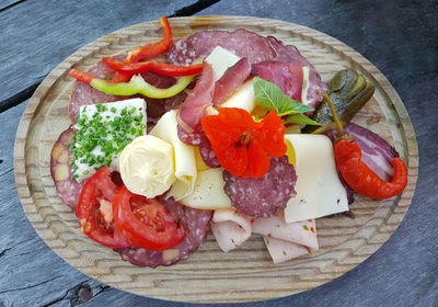 High angle view of fruits in plate on table