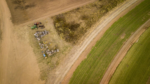High angle view of people riding motorcycle on road