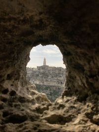 Buildings seen through arch window