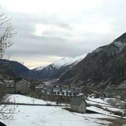 Scenic view of mountains against sky during winter