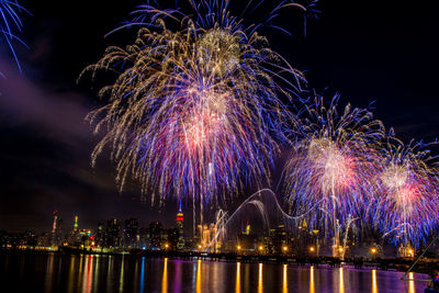 Firework display at night