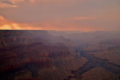 Aerial view of dramatic landscape during sunset