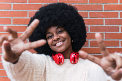 Portrait of young woman with curly hair