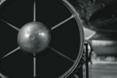 Close-up of ball hanging on metal structure