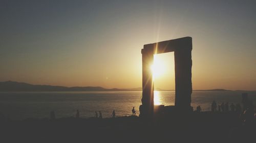 Scenic view of sea against sky at sunset