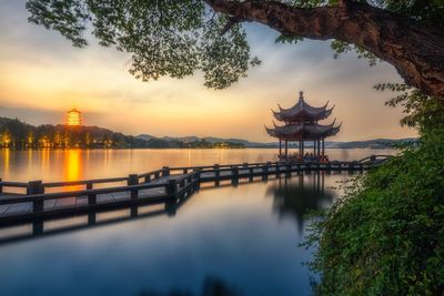 Sunset view of west lake long bridge in hangzhou