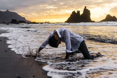 Scenic view of sea at sunset