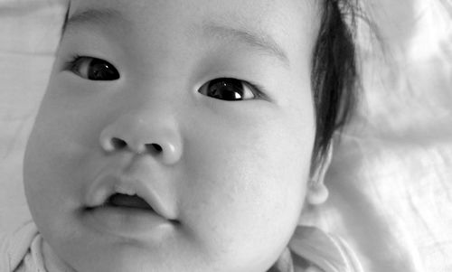 Close-up high angle portrait of cute baby girl