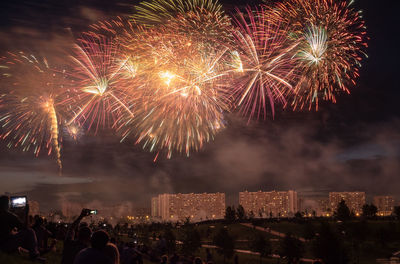 Firework display at night