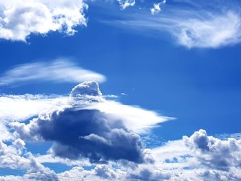 Low angle view of cloudscape against blue sky