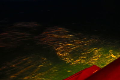 Aerial view of sea against sky at night