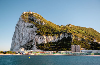 Scenic view of sea against clear blue sky