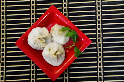 Directly above shot of momos served in plate on table