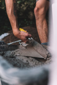 Midsection of man working