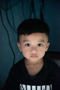 Portrait of boy at home