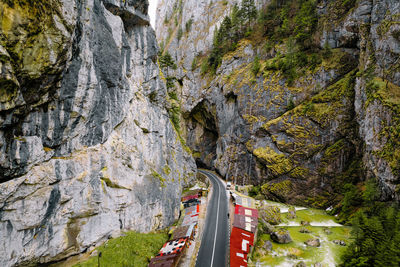 Aerial view of road and shops in mountain canyon