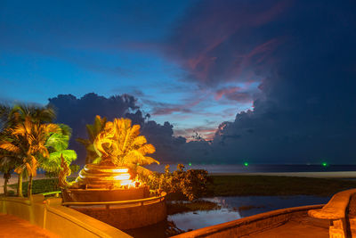 Scenic view of sea against sky at sunset