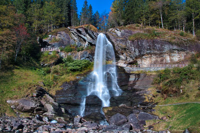 View of waterfall in forest