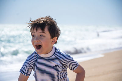 Mid adult man on beach