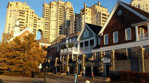 Buildings in city against sky