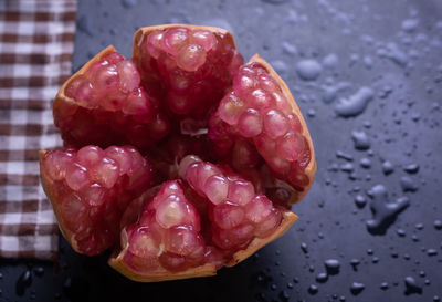 Close-up of wet strawberry on table