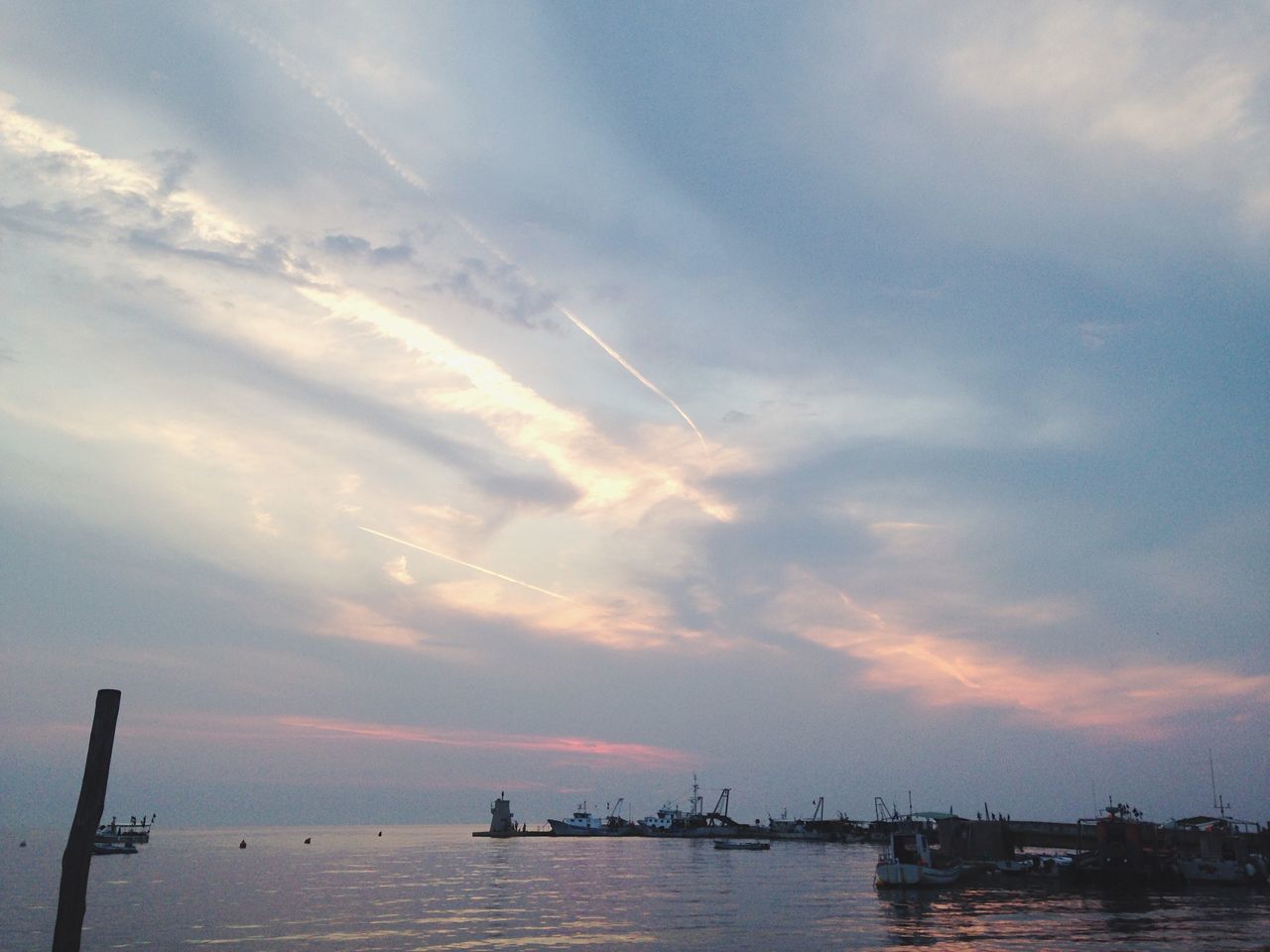 water, sky, waterfront, sea, sunset, cloud - sky, nautical vessel, scenics, beauty in nature, tranquility, tranquil scene, nature, cloud, silhouette, transportation, cloudy, mode of transport, boat, idyllic, outdoors