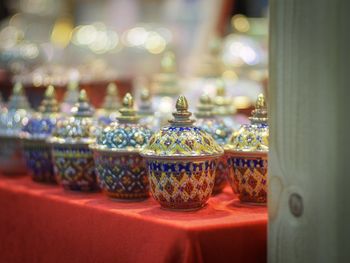 Close-up of candles on table