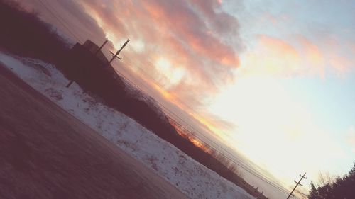 Scenic view of sea against sky at sunset